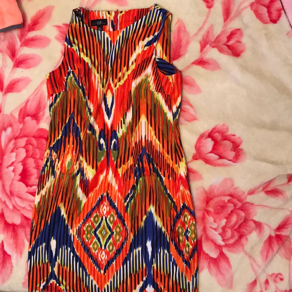 Sleeveless above the knee dress.